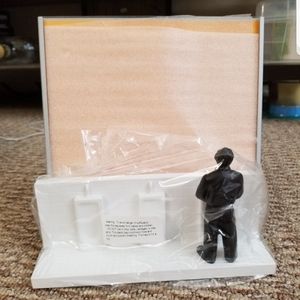 Phot Frame - man standing at urinal in a bathroom